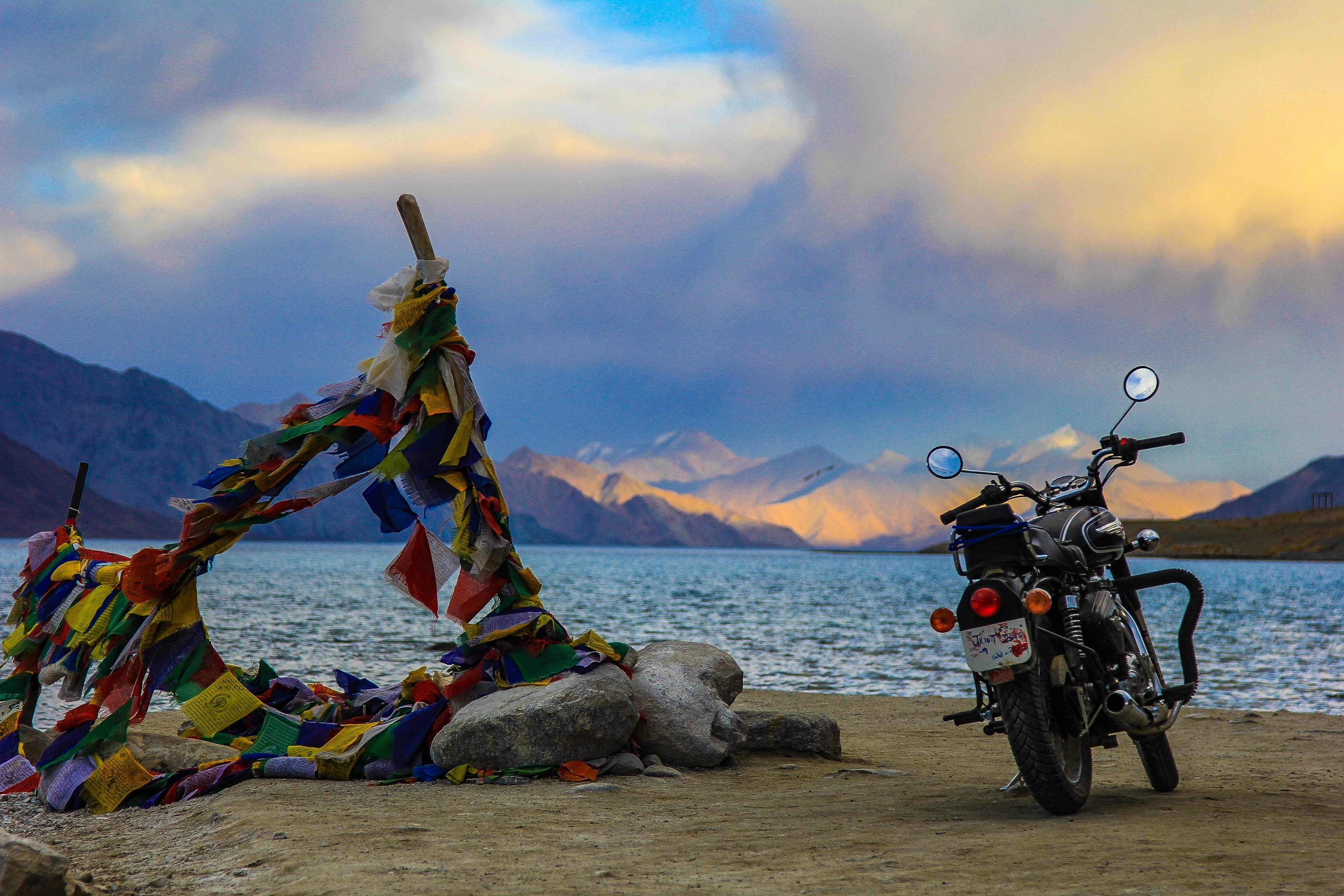 Motorcyclist riding through Ladakh mountains